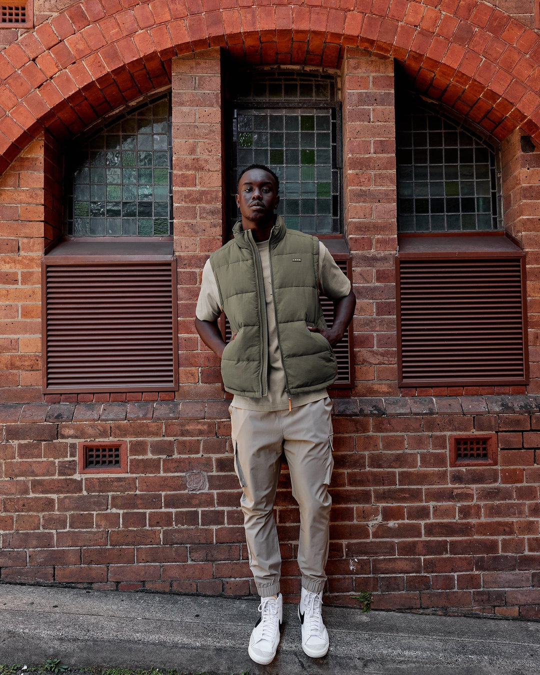 Man wearing Classic Puffer Vest - Tealeaf