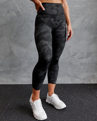 Woman wearing Elixir Ultra High-Rise 7/8 Legging - Black Camo | Model:Annabelle | Size:S