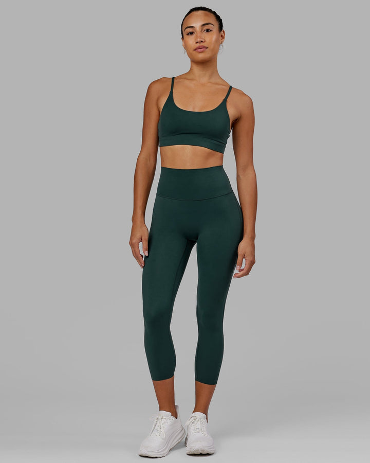 Woman wearing Elixir 7/8 Length Tight - Vital Green