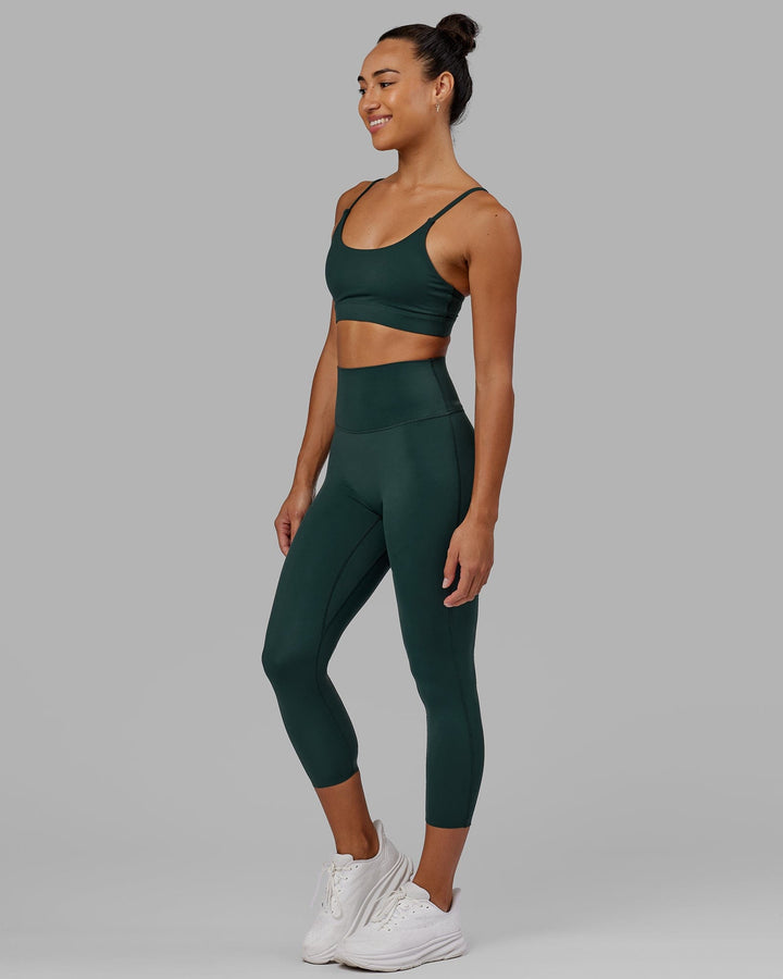 Woman wearing Elixir 7/8 Length Tight - Vital Green