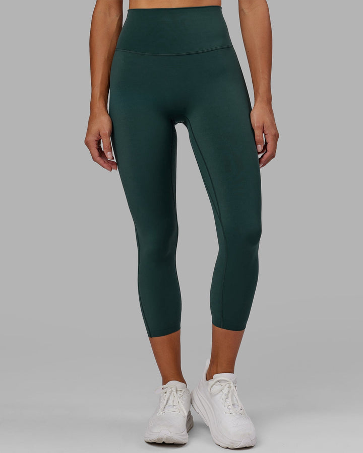 Woman wearing Elixir 7/8 Length Tight - Vital Green