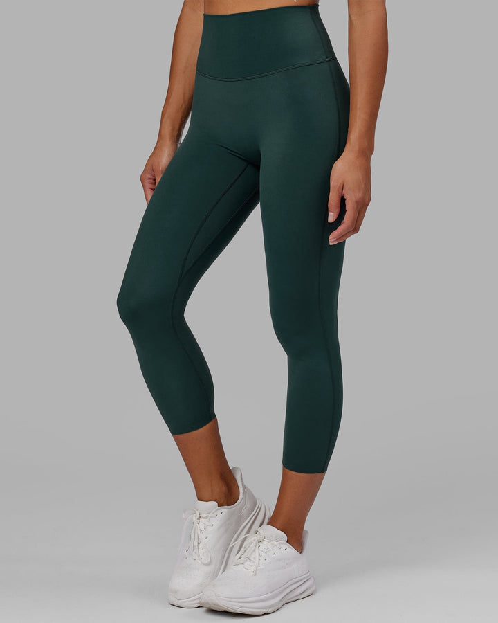 Woman wearing Elixir 7/8 Length Tight - Vital Green
