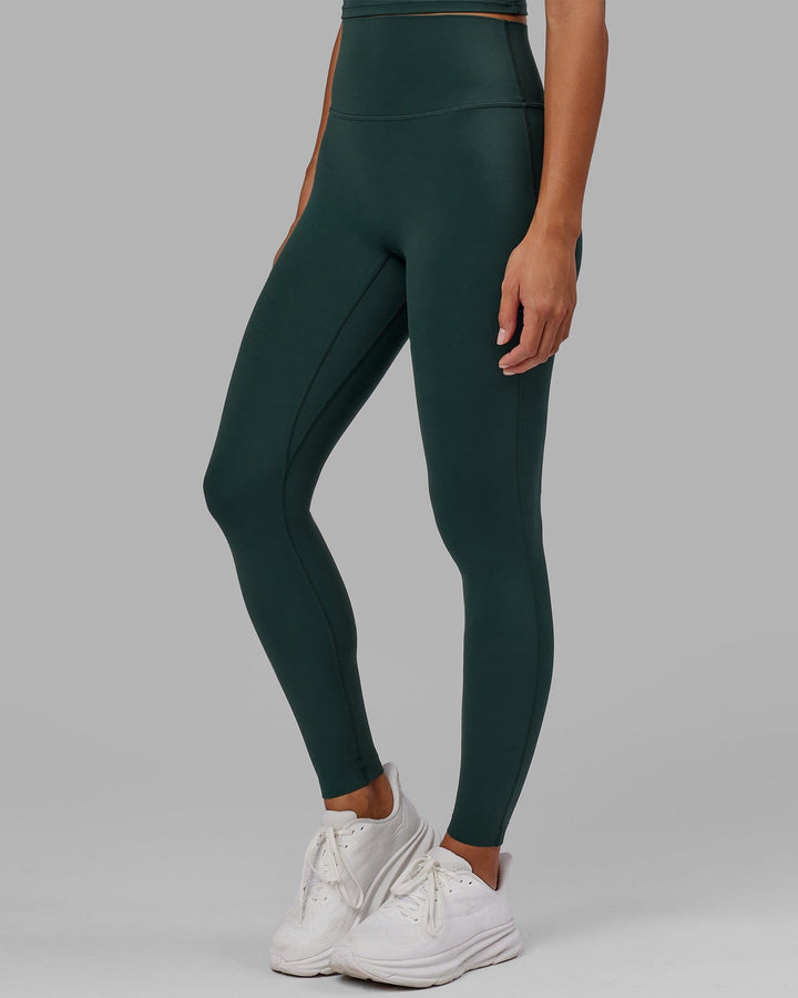 Woman wearing Elixir Full Length Tight - Vital Green