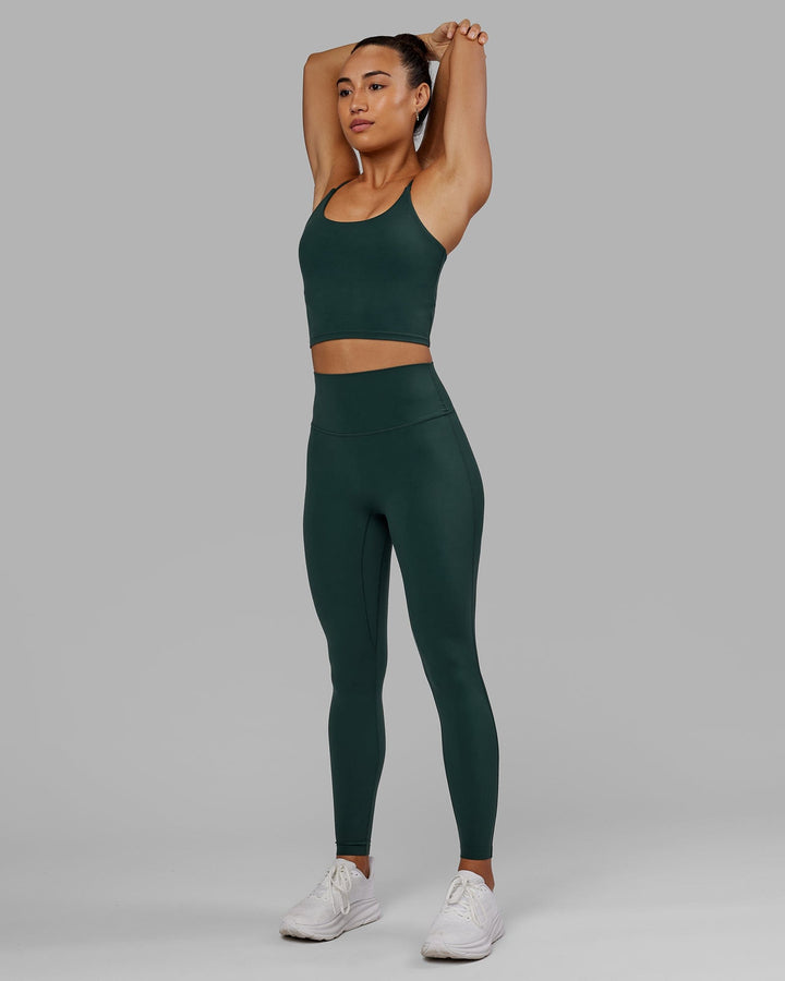 Woman wearing Elixir Full Length Tight - Vital Green