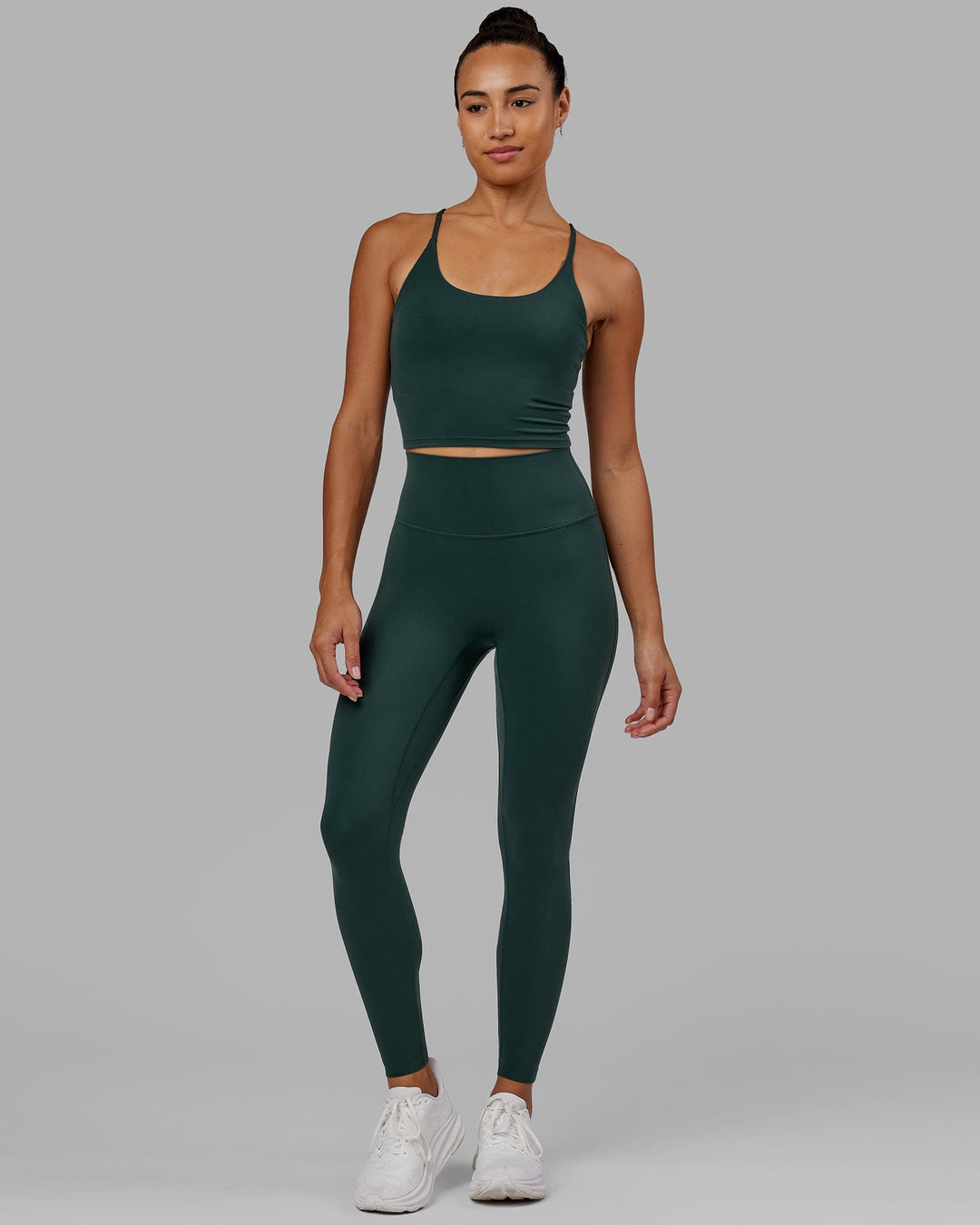 Woman wearing Elixir Full Length Tight - Vital Green