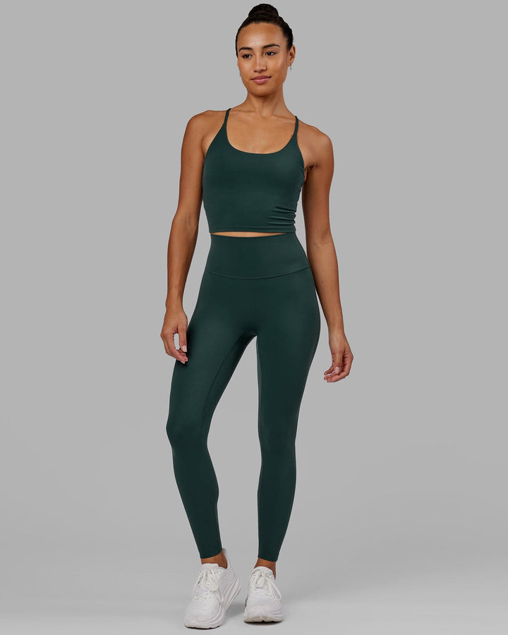 Woman wearing Elixir Full Length Tight - Vital Green