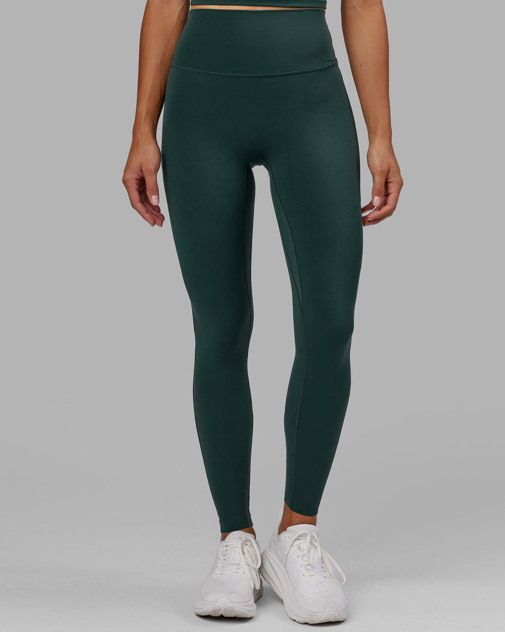 Woman wearing Elixir Full Length Tight - Vital Green
