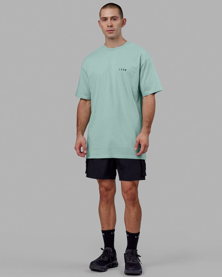 Man wearing Endeavour Heavyweight Long Line Tee Oversize - Pastel Turquoise