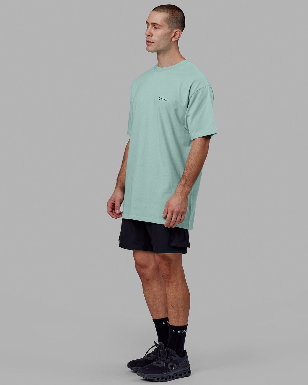 Man wearing Endeavour Heavyweight Long Line Tee Oversize - Pastel Turquoise