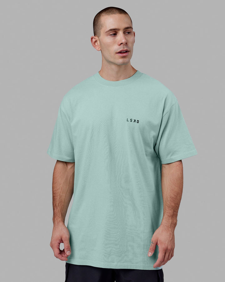 Man wearing Endeavour Heavyweight Long Line Tee Oversize - Pastel Turquoise