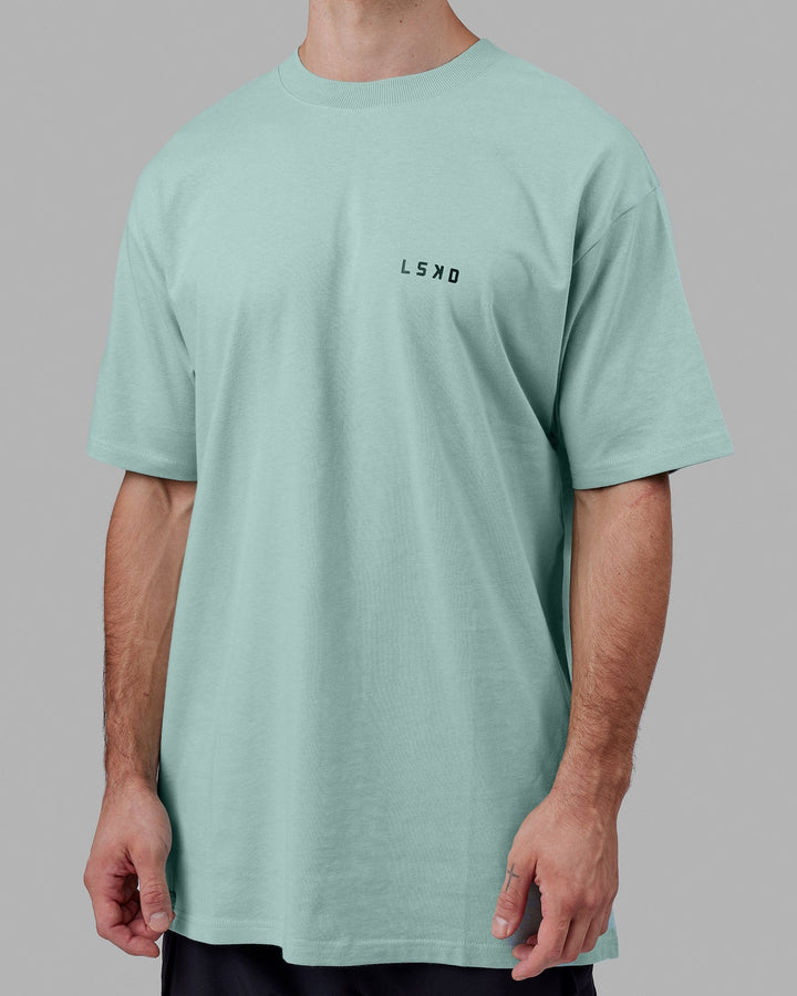 Man wearing Endeavour Heavyweight Long Line Tee Oversize - Pastel Turquoise