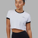Woman wearing Excel Ringer Tee - White-Black