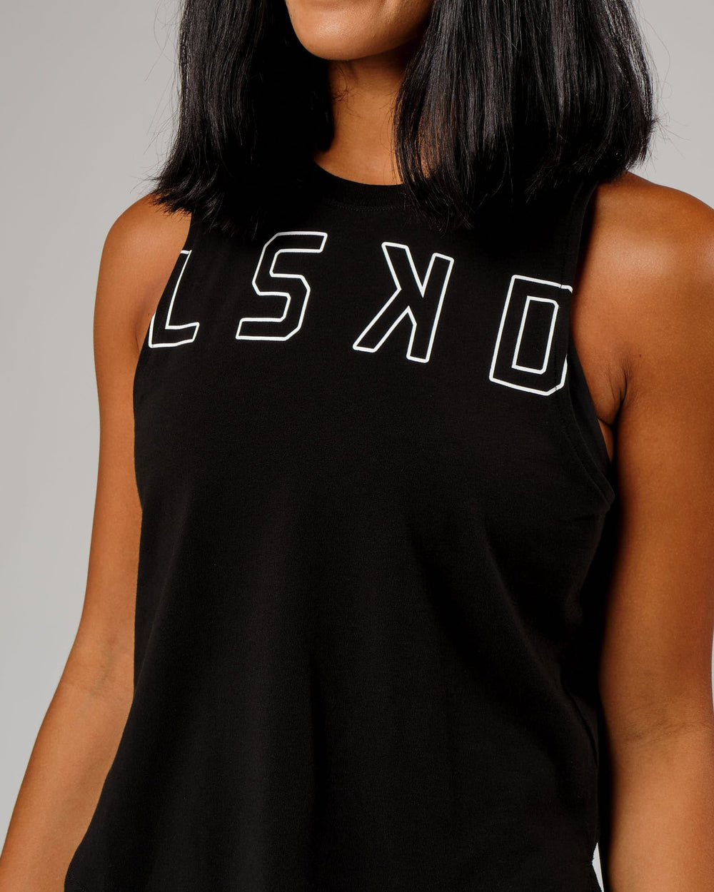 Woman wearing Expand FLXCotton Tank - Black