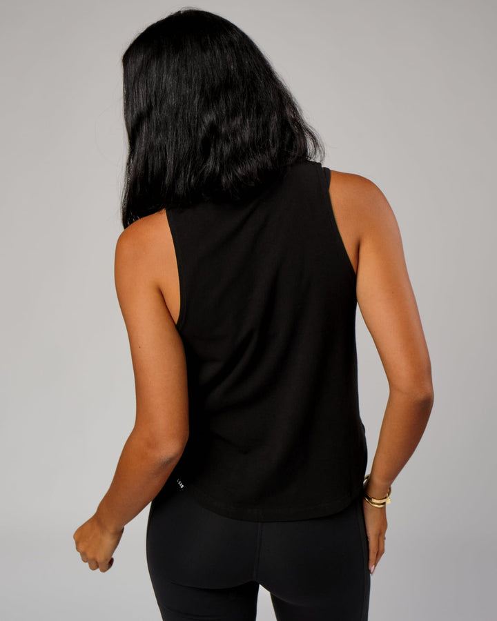 Woman wearing Expand FLXCotton Tank - Black