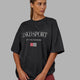 Woman wearing Unisex Flag Heavyweight Tee Oversize - Phantom
