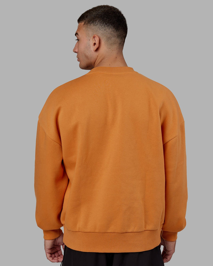 Man wearing Unisex Flag Sweater Oversize - Sundial