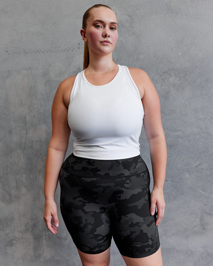 Woman wearing Flow Performance Tank - White