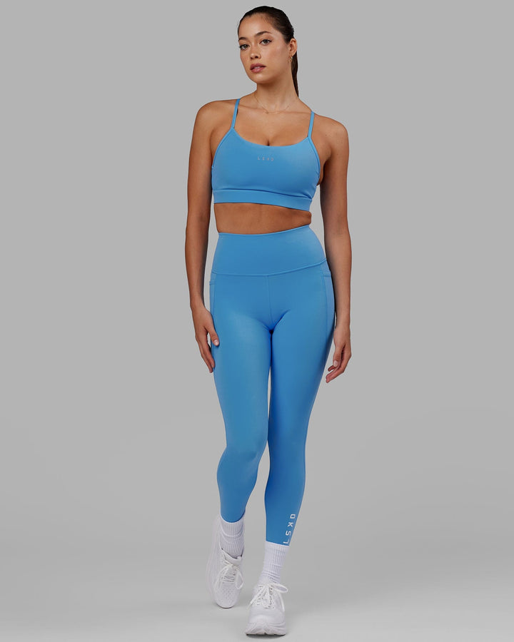 Woman wearing Flux 7/8 Length Tight - Azure Blue