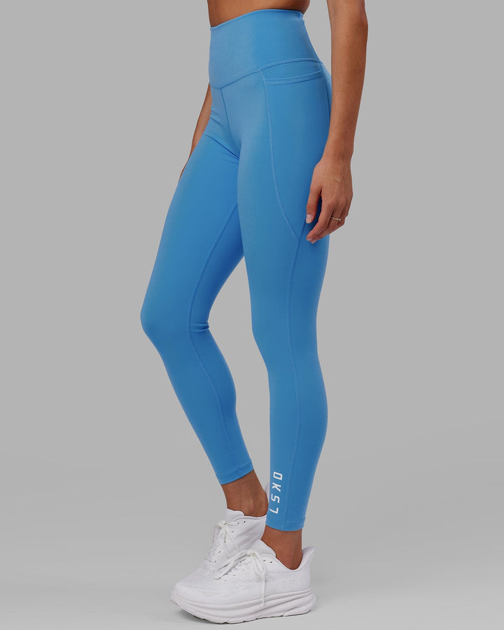 Woman wearing Flux Full Length Tight - Azure Blue