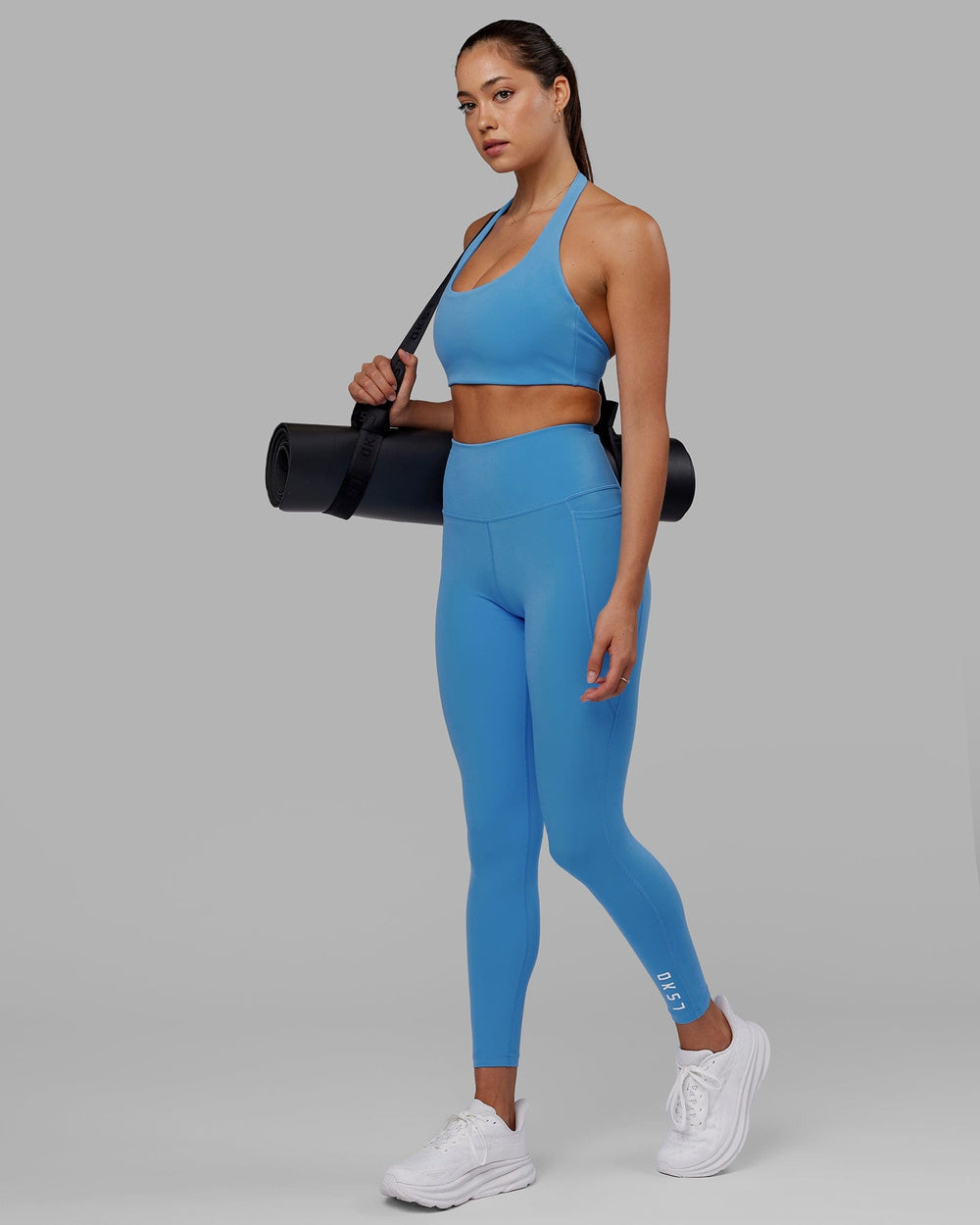 Woman wearing Flux Full Length Tight - Azure Blue
