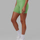 Woman wearing Flux Mid Short Tight - Apple Mint