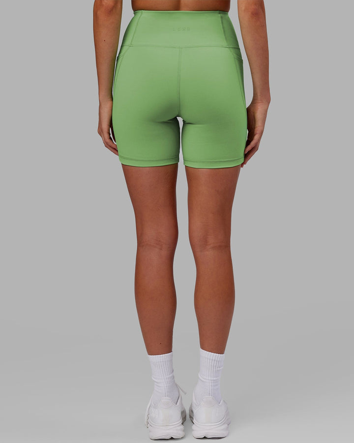 Woman wearing Flux Mid Short Tight - Apple Mint