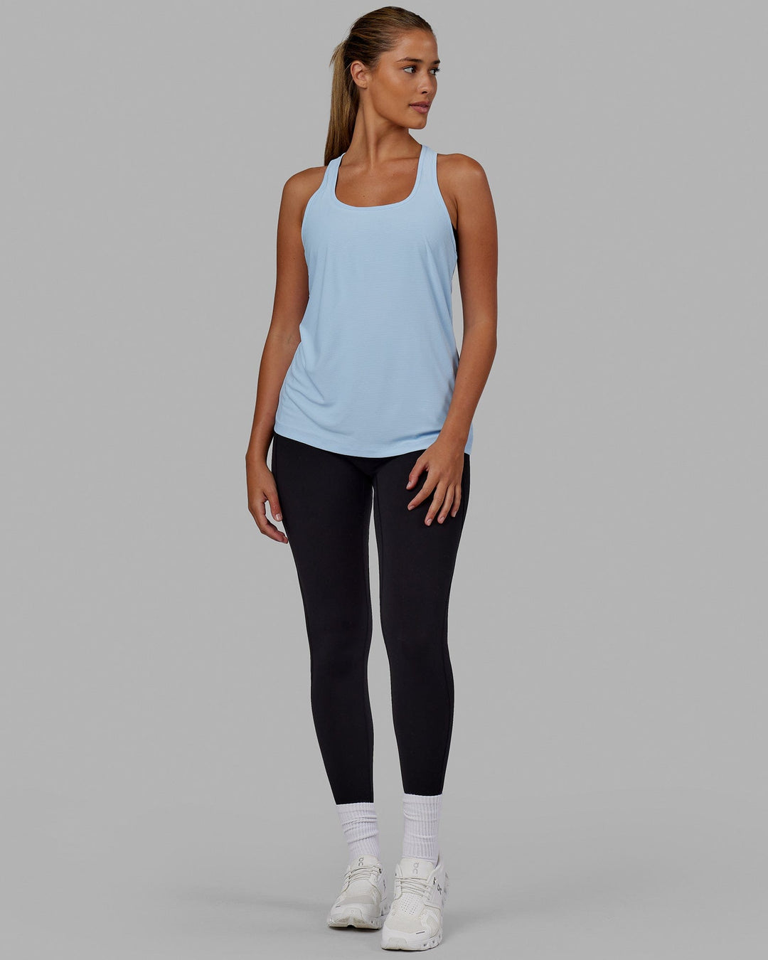 Woman wearing Freedom Performance Tank - Windsurfer