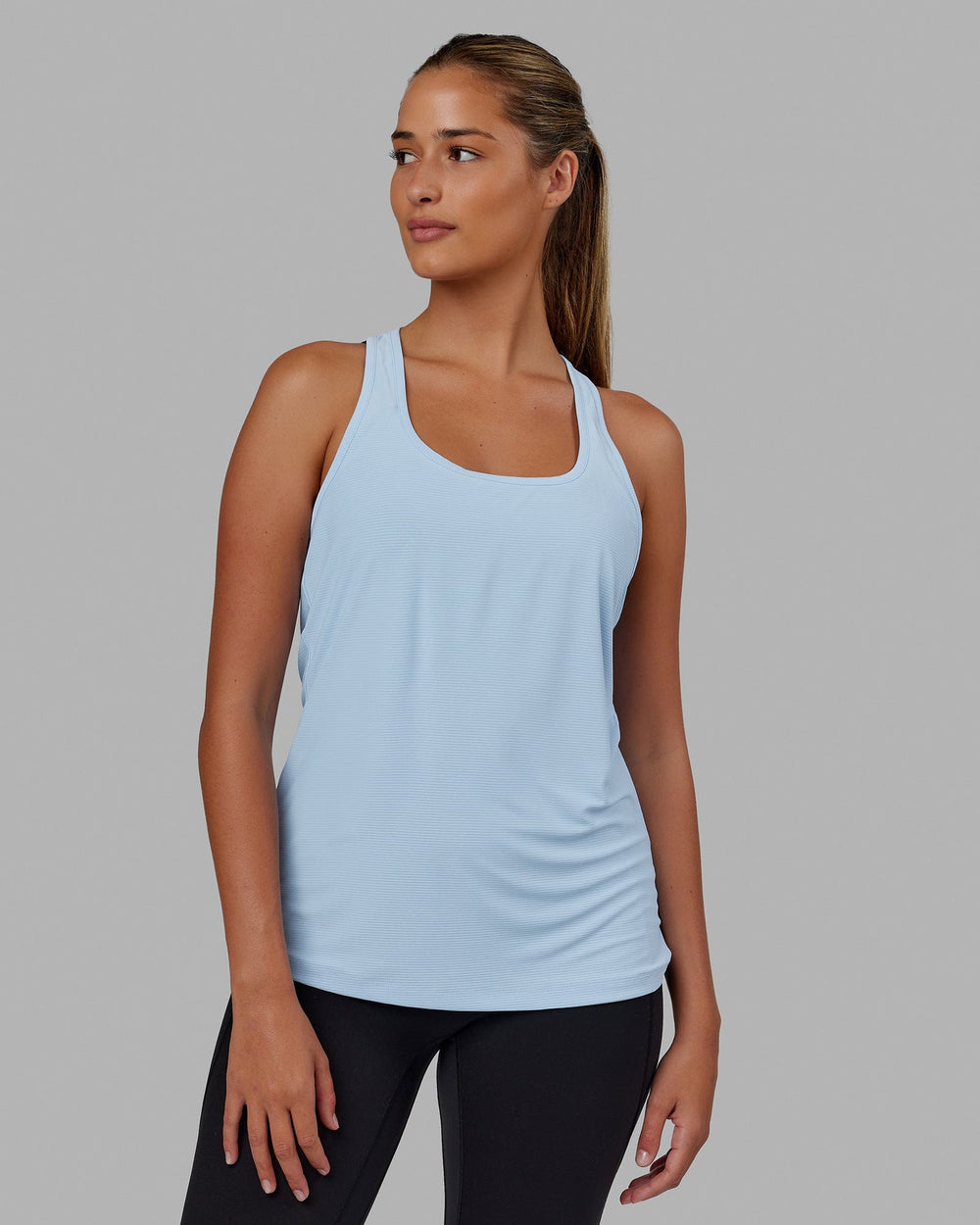Woman wearing Freedom Performance Tank - Windsurfer