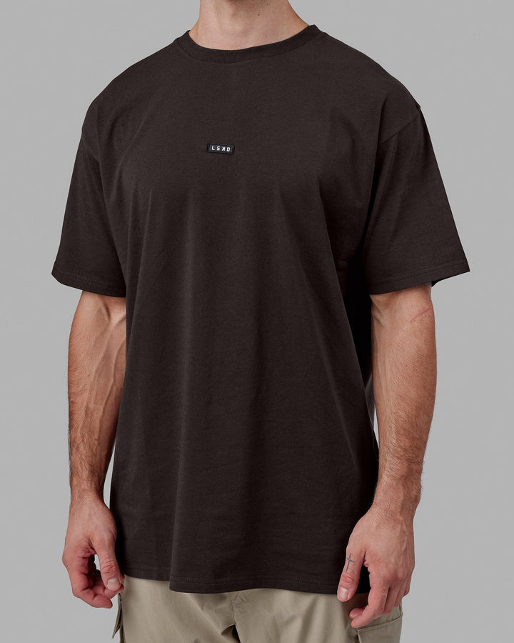 Man wearing Fundamental FLXCotton Tee Longline Oversize - Dark Walnut