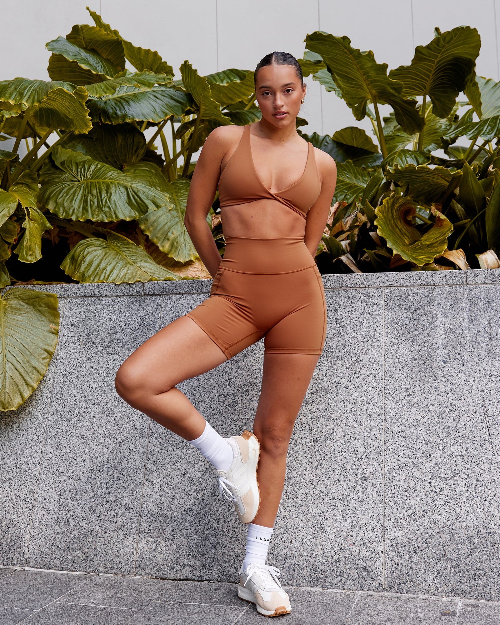 Woman wearing Fusion Ultra High-Rise 6" Short Pockets - Hazel | Model:Milly | Size:S