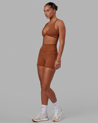 Woman wearing Fusion Ultra High-Rise 4" Short Pockets - Hazel | Model:Milly | Size:S