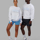 Duo wearing Unisex Heritage Sweater Oversize - White-Blue