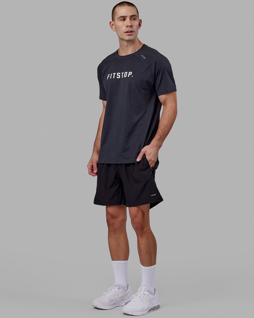 Man wearing LSKD x FS VapourFLX Trainer Tee - Black Marl