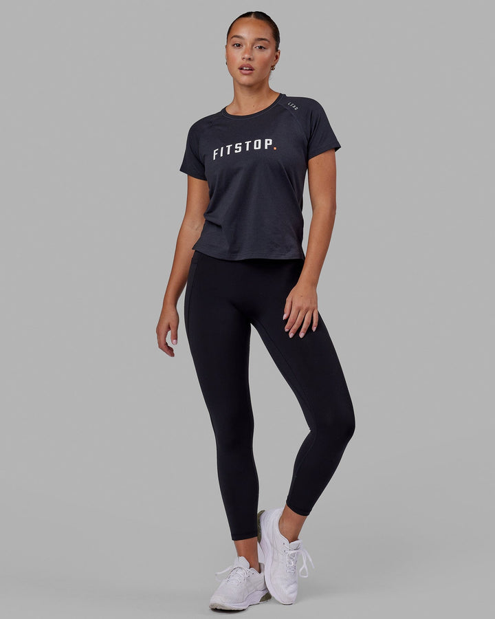 Woman wearing LSKD x FS VapourFLX Trainer Tee - Black Marl