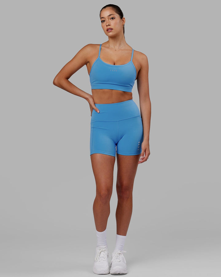 Woman wearing Lift Sports Bra - Azure Blue