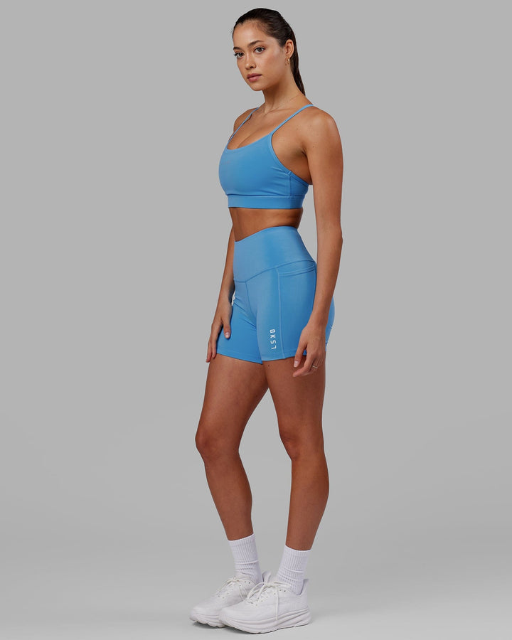 Woman wearing Lift Sports Bra - Azure Blue