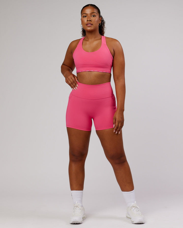 Woman wearing MVP Sports Bra - Flamingo