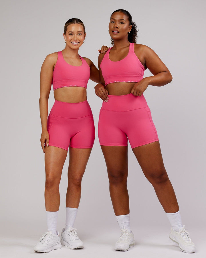Woman wearing MVP Sports Bra - Flamingo