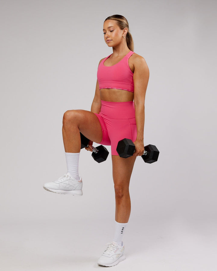 Woman wearing MVP Sports Bra - Flamingo