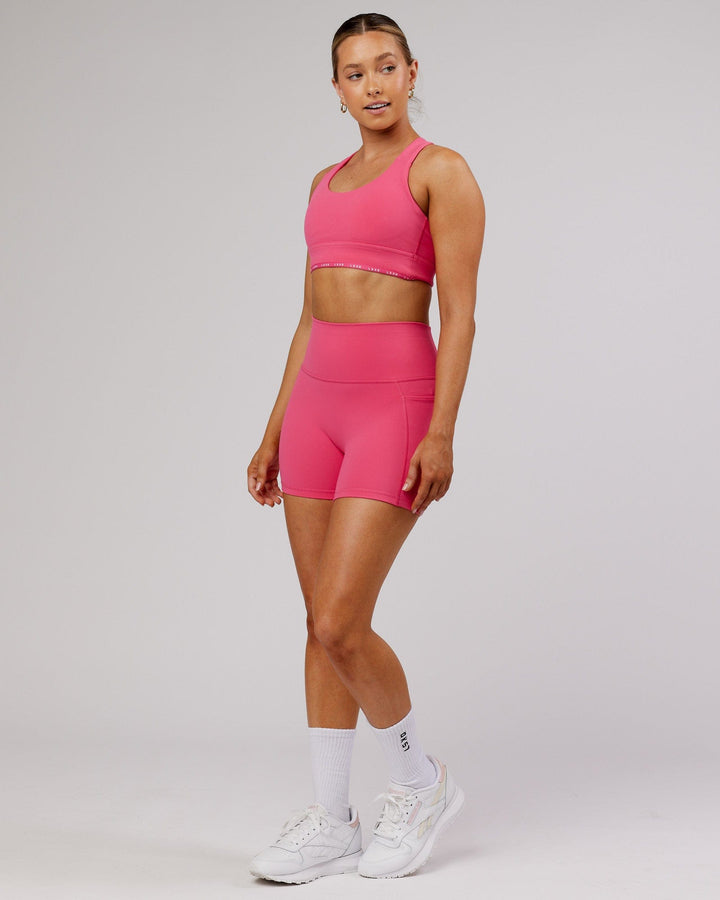 Woman wearing MVP Sports Bra - Flamingo