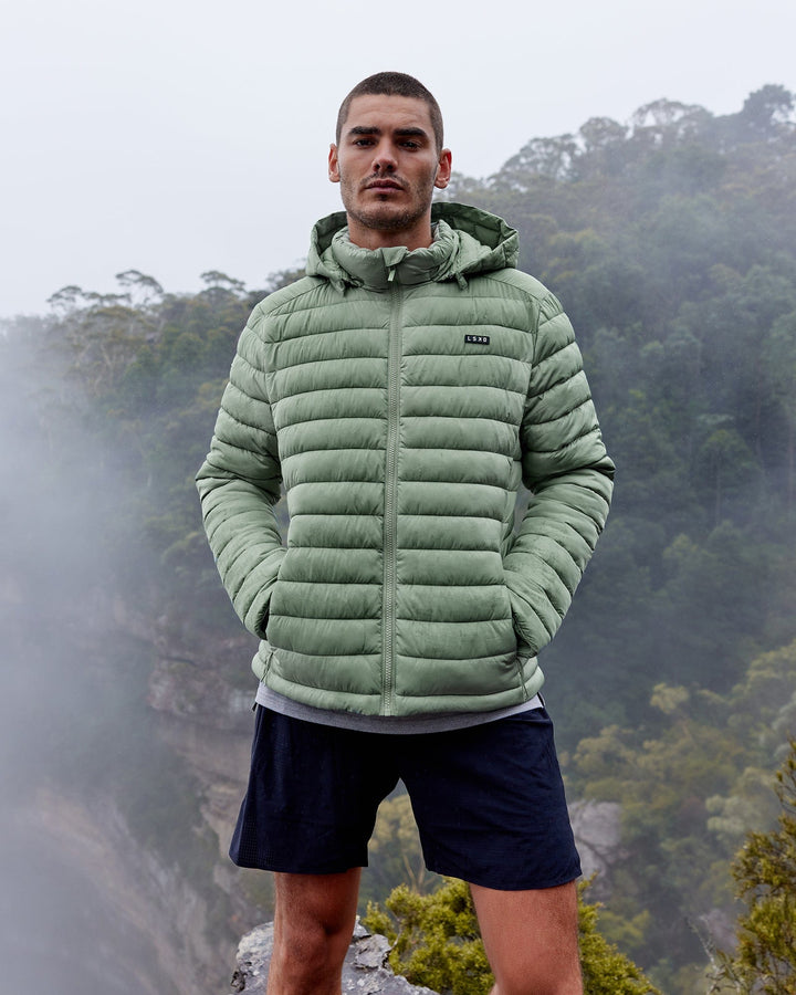  Man wearing All-day Puffer Jacket - Iceberg Green