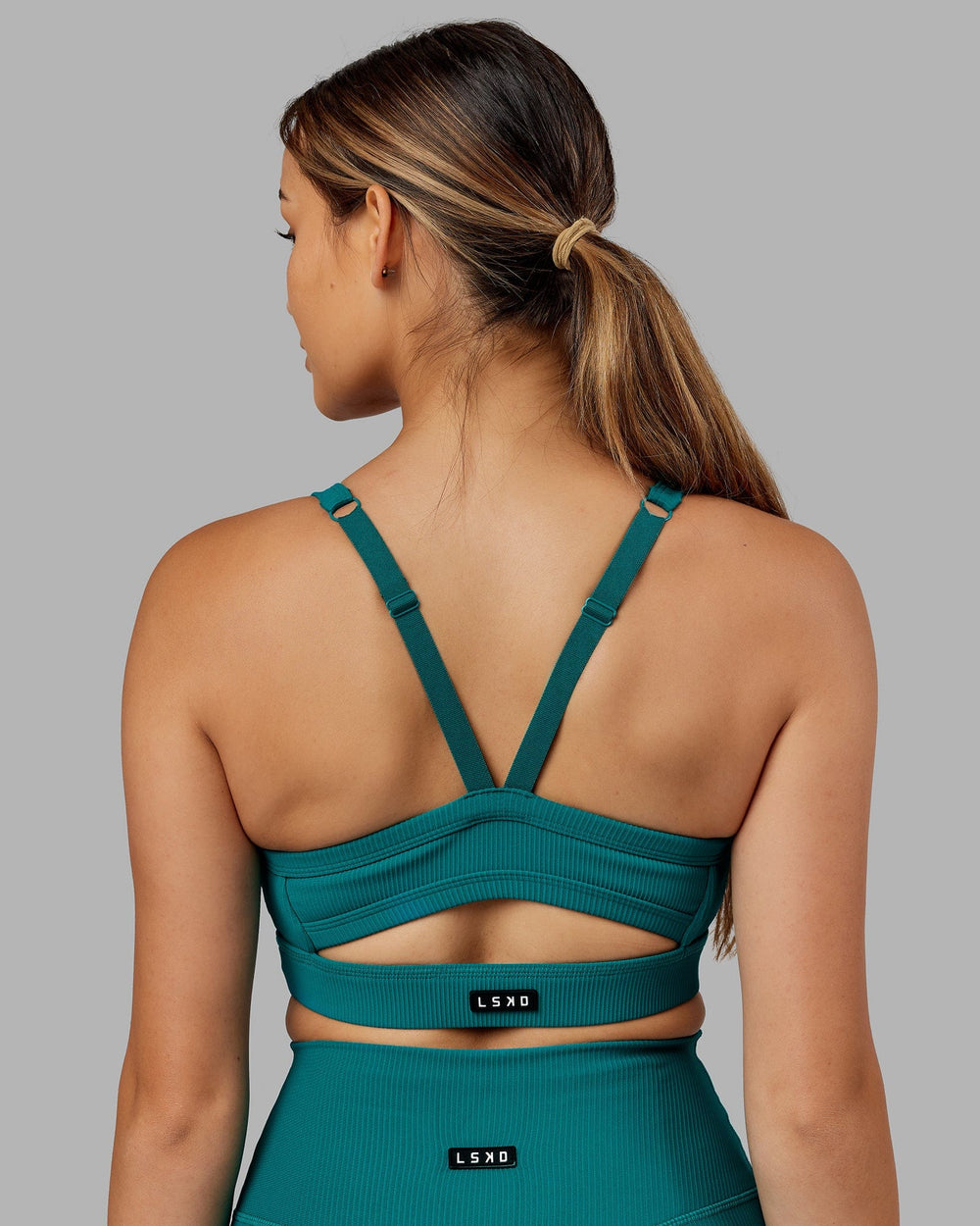 Woman Wearing Momentum Ribbed Sports Bra - Sea Green