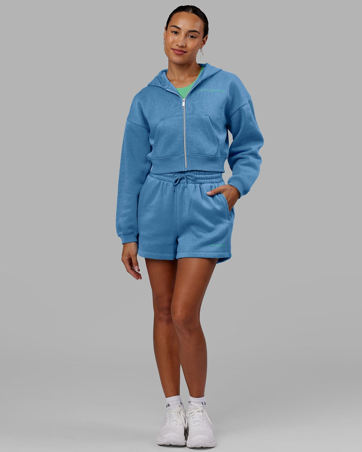 Woman wearing Motion Cropped Hoodie - Azure Blue