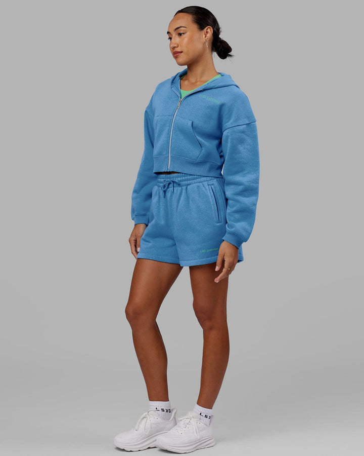 Woman wearing Motion Cropped Hoodie - Azure Blue