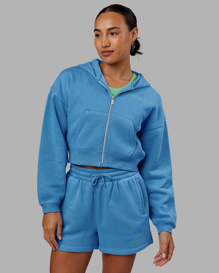 Woman wearing Motion Cropped Hoodie - Azure Blue