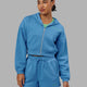 Woman wearing Motion Cropped Hoodie - Azure Blue