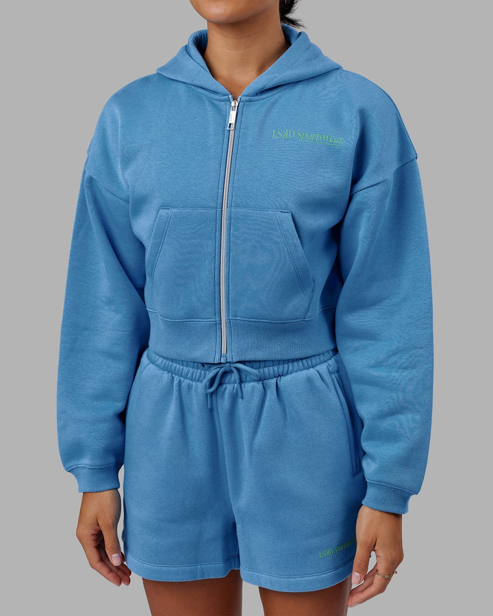 Woman wearing Motion Cropped Hoodie - Azure Blue