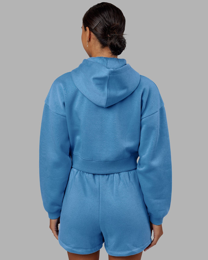 Woman wearing Motion Cropped Hoodie - Azure Blue