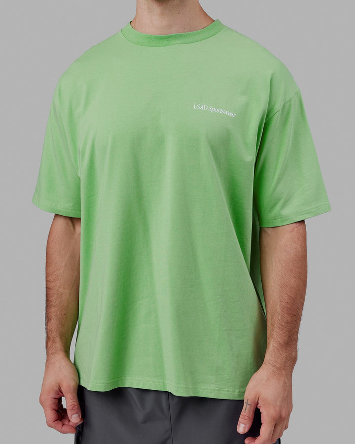 Man wearing Unisex Motion FLXCotton Tee Oversize - Apple Mint