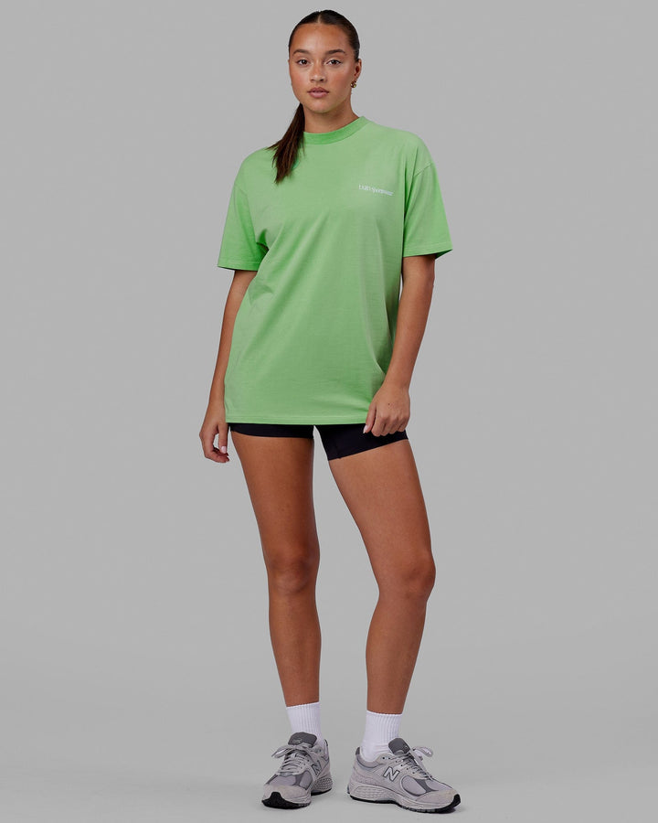 Woman wearing Unisex Motion FLXCotton Tee Oversize - Apple Mint